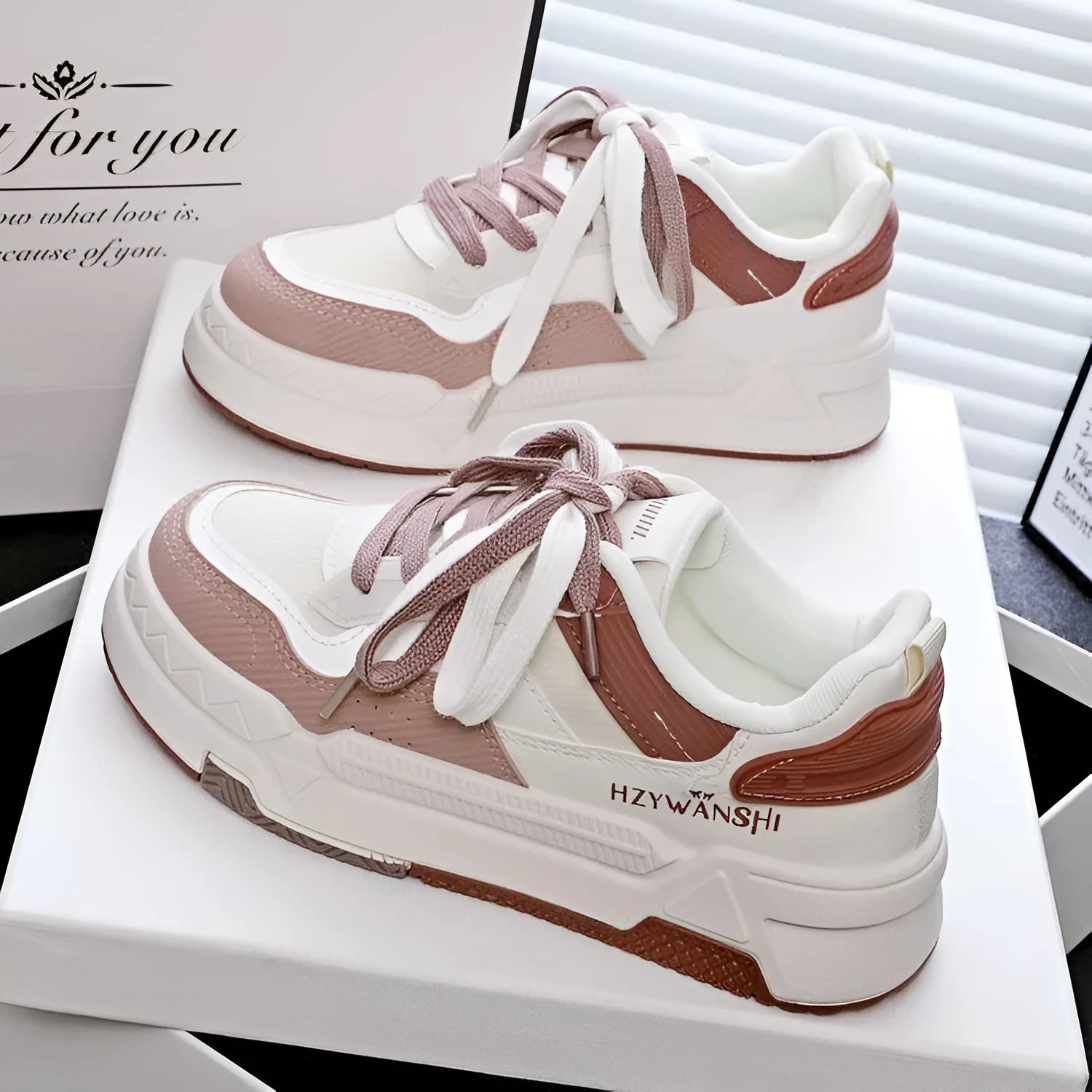 Children's beige board shoes with thick rubber sole, cross straps, and round toe on a white background.