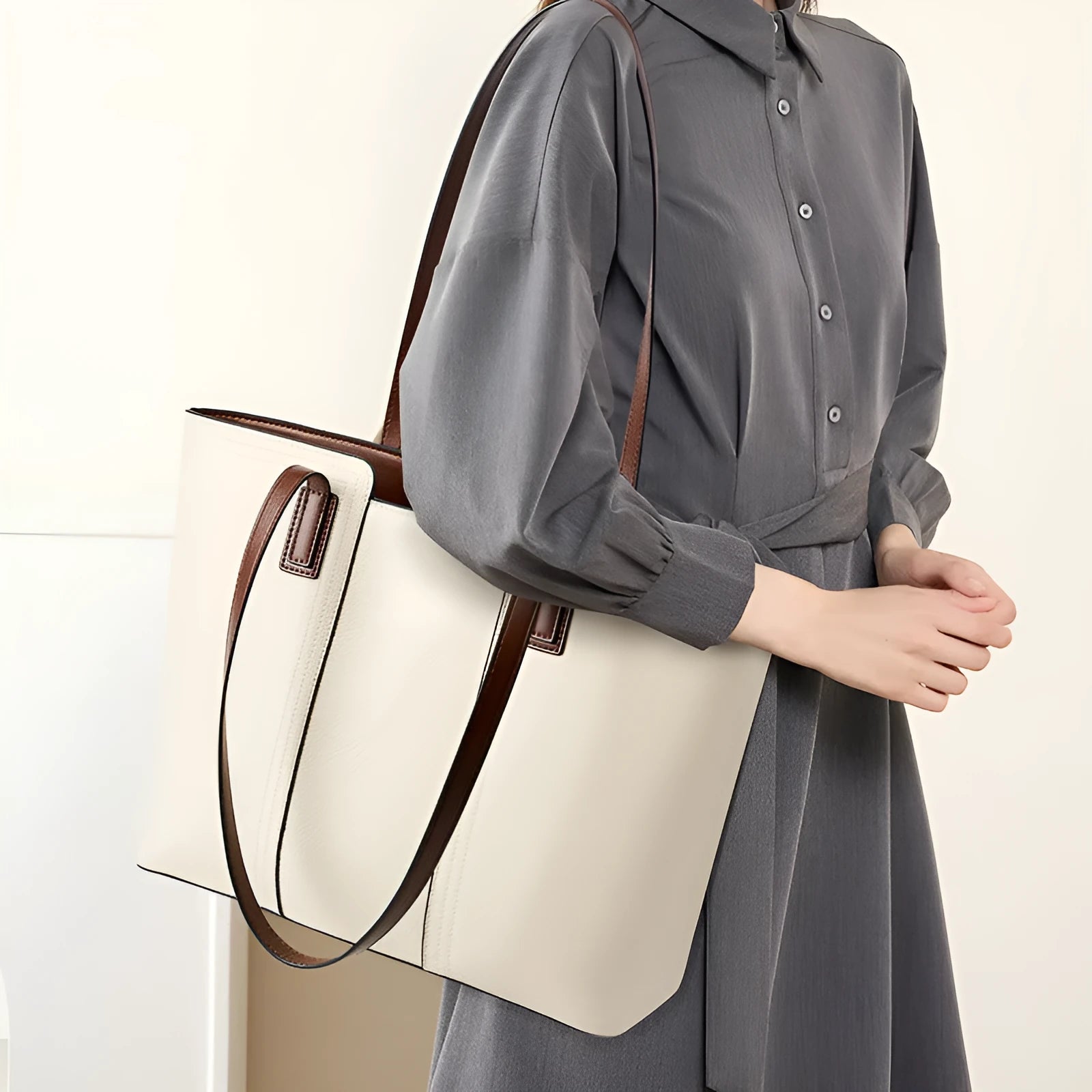 Black genuine leather women's commuter shoulder bag with horizontal square shape and single shoulder strap