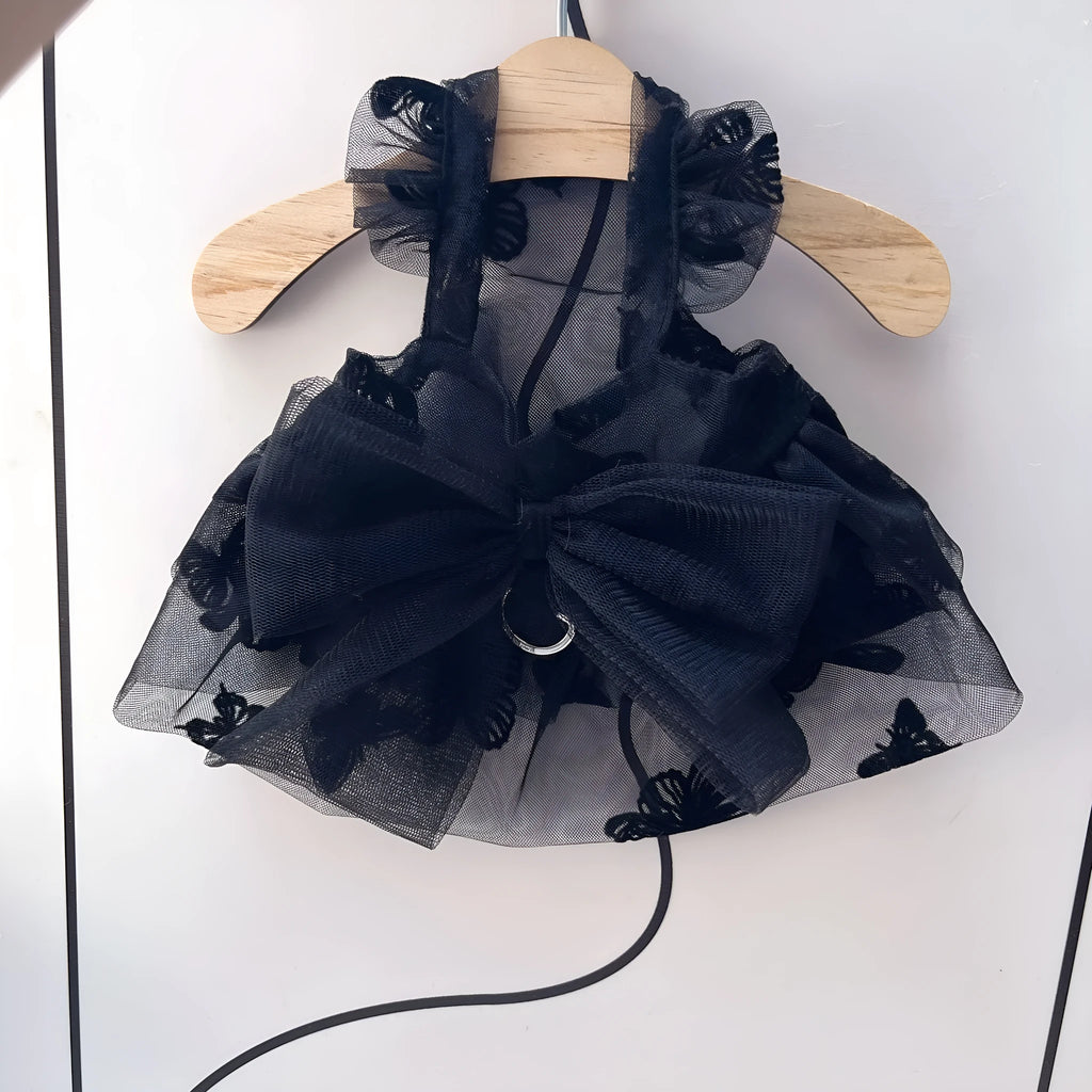 Black tulle princess skirt costume on a small dog, showing the gauze material and fit.