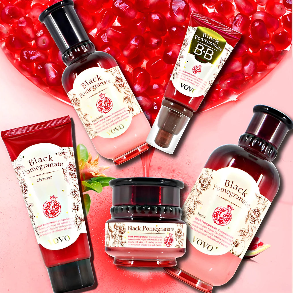 Pomegranate skincare set showing six bottles: cleanser, water, milk, essence, cream, and eye cream.