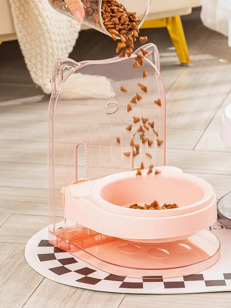 Grey pet feeding bowl with cat ear design and removable hanging cage attachment