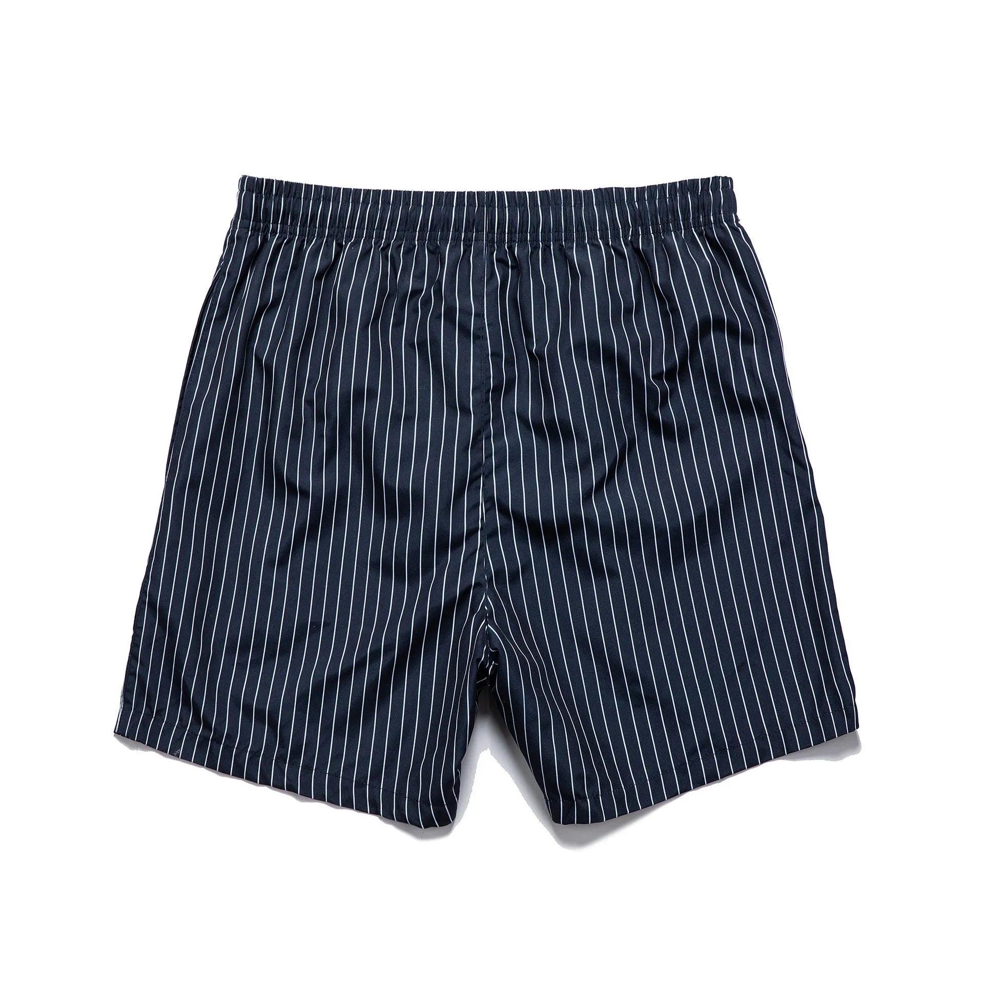 Navy blue striped beach shorts with straight legs on a mannequin.