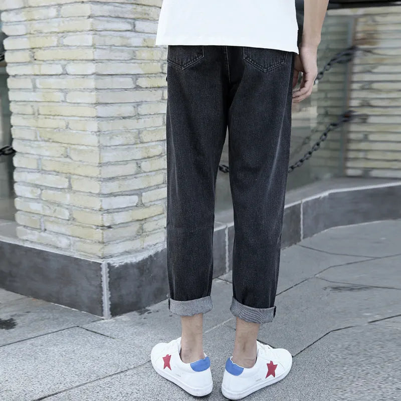 Men's loose straight leg harem jeans in black or blue cotton fabric with college style