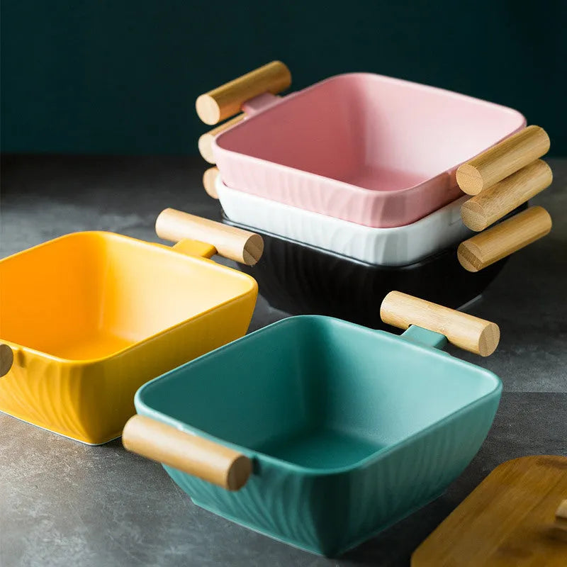 Modern irregular shaped ceramic bowl with matching lid in heat-resistant porcelain