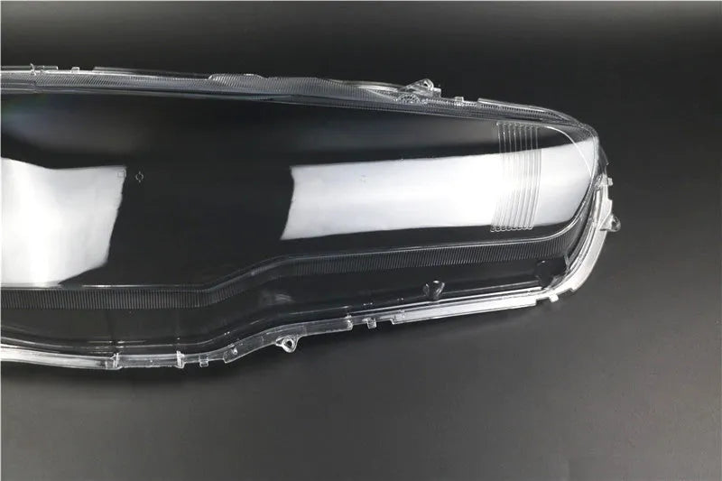Transparent plastic headlight housing cover with 50mm x 30mm x 20mm dimensions