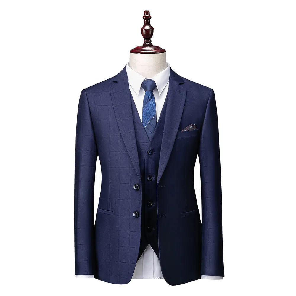 Men's navy blue plaid slim fit three-piece business casual suit with jacket, vest, and trousers