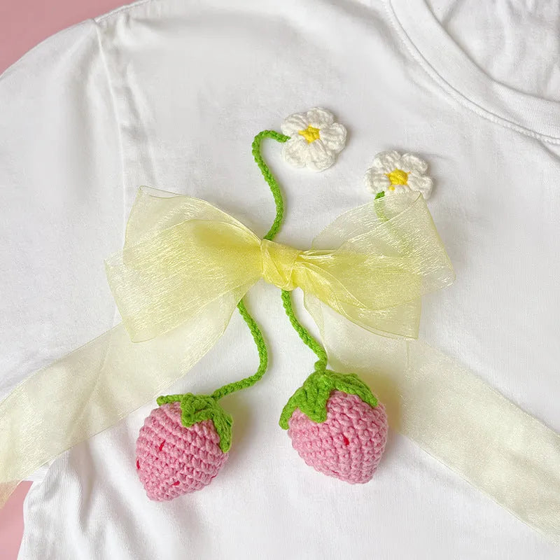 Wool crochet strawberry pendant necklace with knitted wool construction measuring 35cm