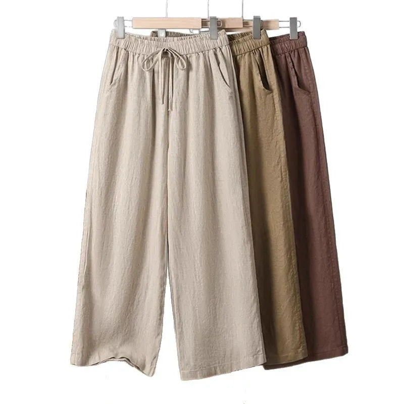 Women's straight-leg casual trousers with elastic waist and lace-up drawstring in apricot colour