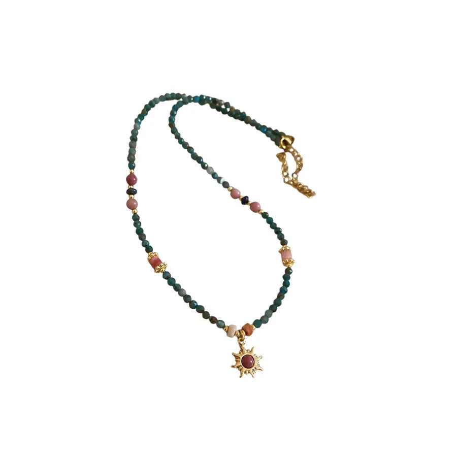 Freshwater pearl necklace with stone pendant and sun charm in geometric French royal court style
