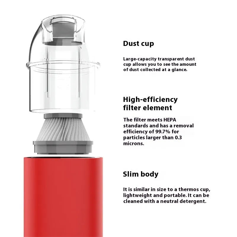 Portable desktop nozzle dust and debris cleaner handheld vacuum on desk surface