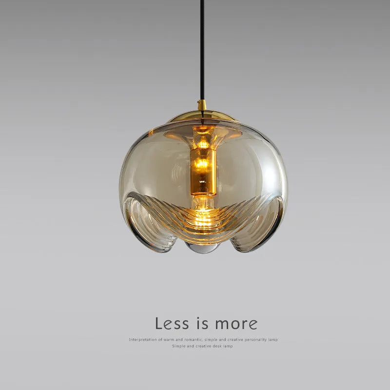 Modern minimalist glass chandelier with 25cm diameter, shown in transparent, amber, or smoky gray colour options.