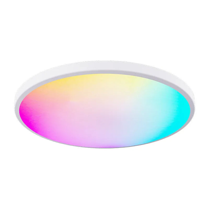 Modern round Bluetooth RGBCW ceiling panel light with remote control, shown in a white finish on a ceiling.