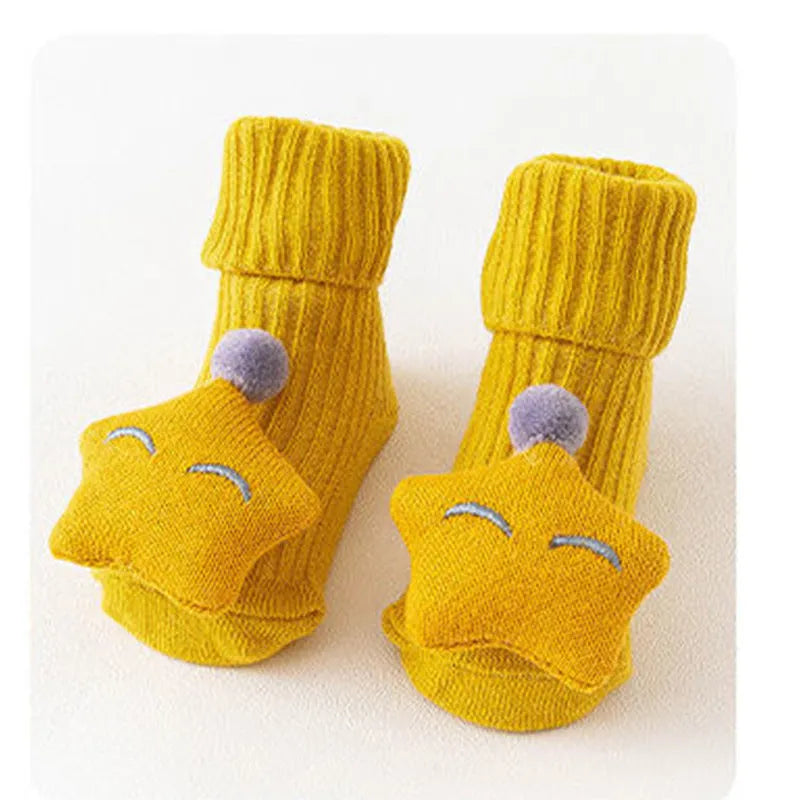 Cotton baby floor socks in blue bow pattern for infants 0-3 months.