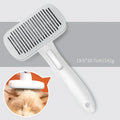 Blue automatic pet hair removal comb with a one-click button, shown on a grey background.