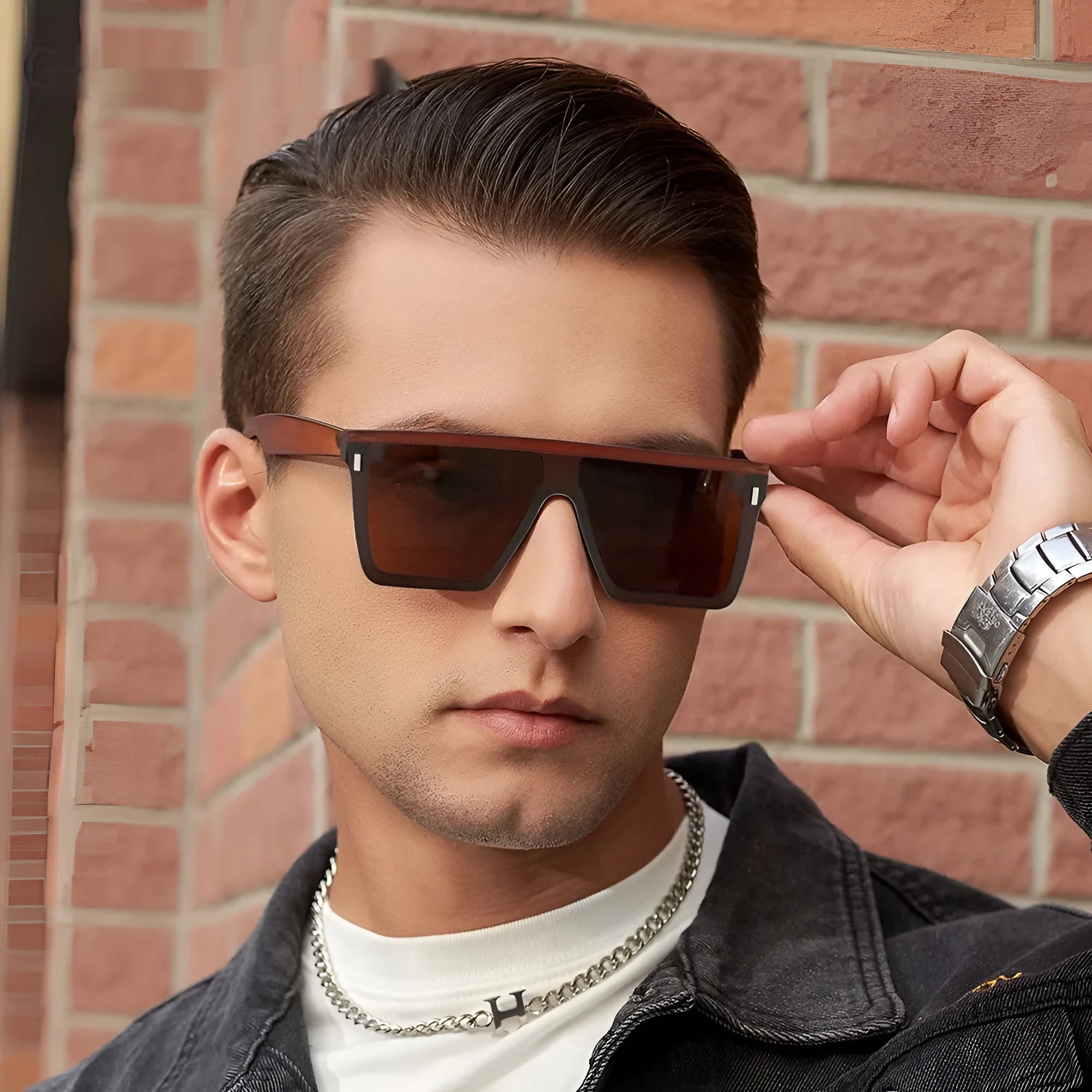 Polarised sunglasses in sand black frame with grey lenses, suitable for outdoor sports and fashion.