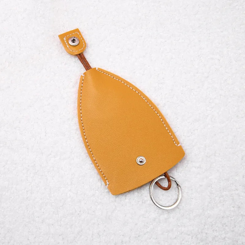 Cartoon style pull-out car key case made from PU leather in assorted designs