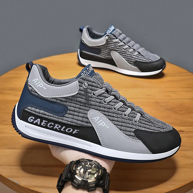 Men's green and grey mesh running shoes with round toe design and front lace-up closure
