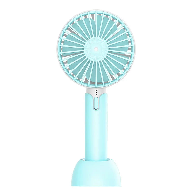 Blue handheld and desktop mini USB fan with oscillation function on a table.