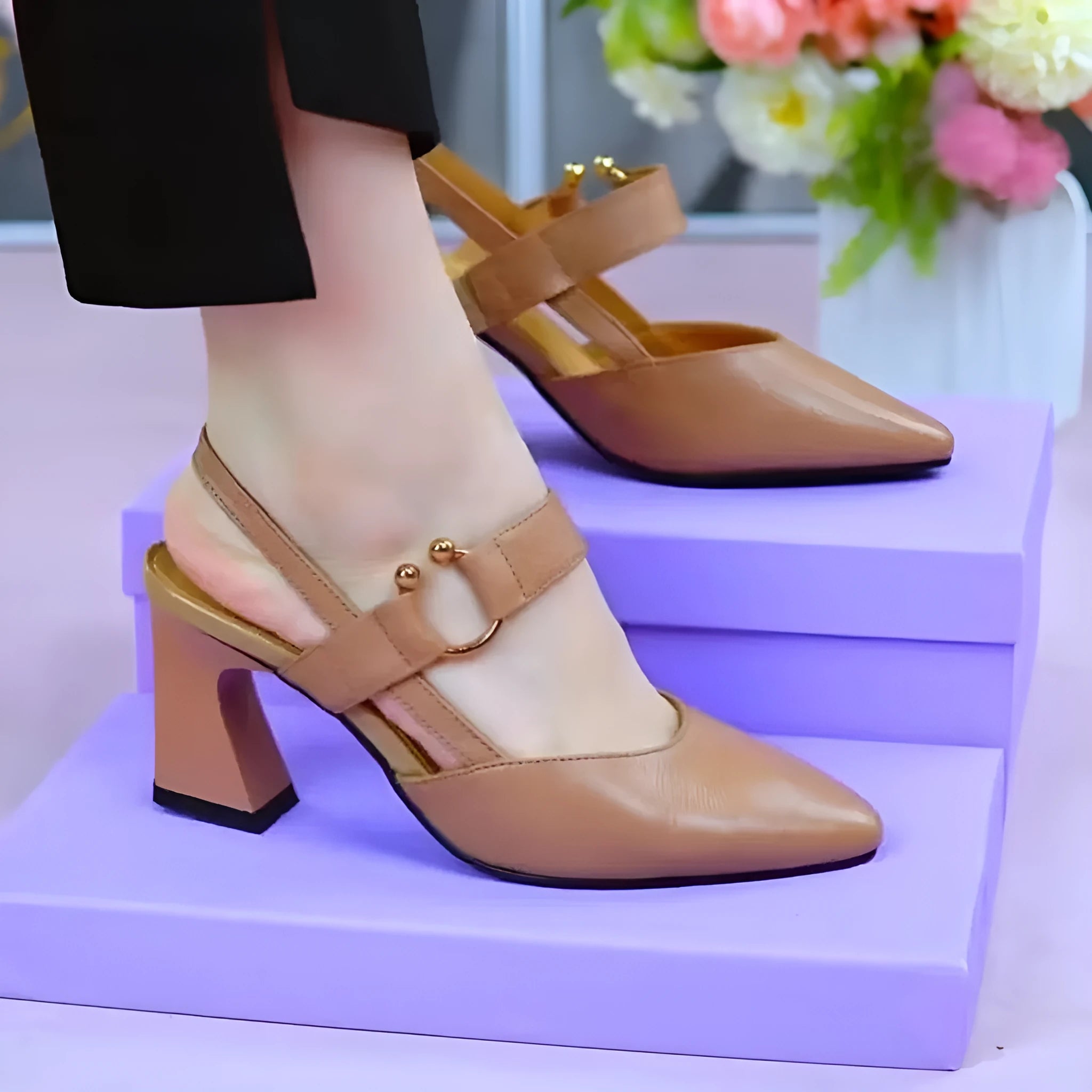 Women's apricot coloured leather sandals with a closed toe, chunky heel, and rubber sole