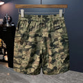 Men's camouflage cargo shorts in cotton blend fabric with cargo pockets and loose fit