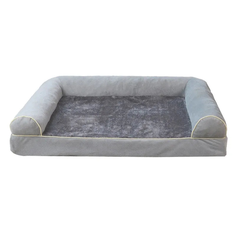 Square blue cloth dog bed with sponge fill on a wooden floor