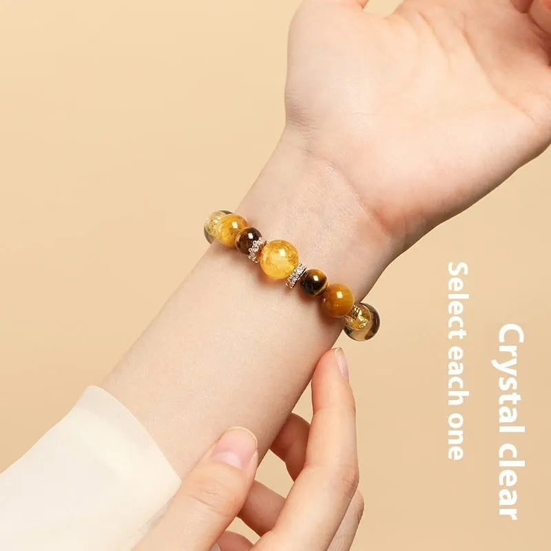 Yellow Tiger-eye crystal bracelet with 10mm geometric tower beads on wrist