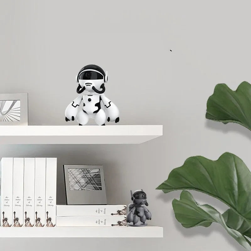 Black or white smart security camera with detachable base for household monitoring.