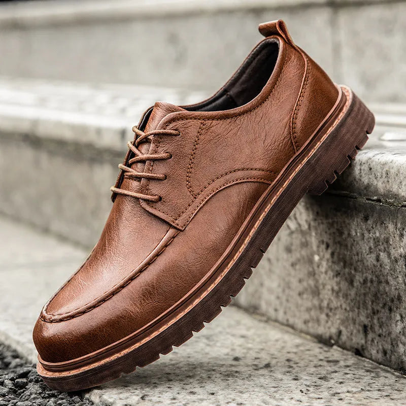 Men's brown casual leather slip-on shoes with round toe and rubber sole
