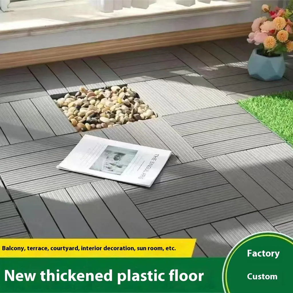 Ten wood grain finish plastic interlocking floor tiles showing their 300x300mm size and non-slip surface.