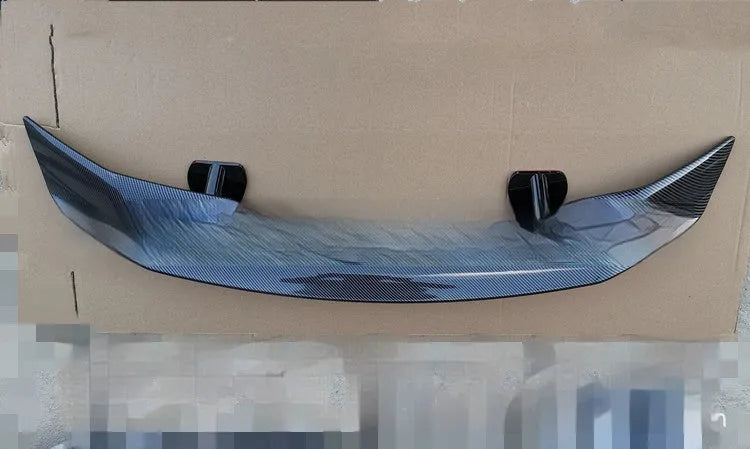 Universal punch-free car tail wing spoiler in ABS material showing four finish options
