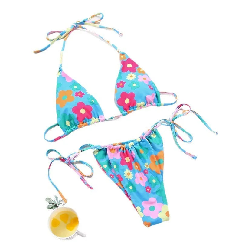Women's polka dot print split bikini swimsuit in briefs and triangle styles on a mannequin