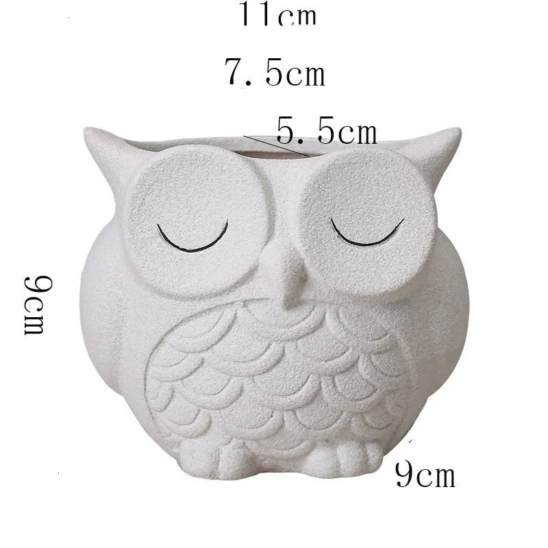 Handmade frosted ceramic owl design succulent flower pot in light pink colour.
