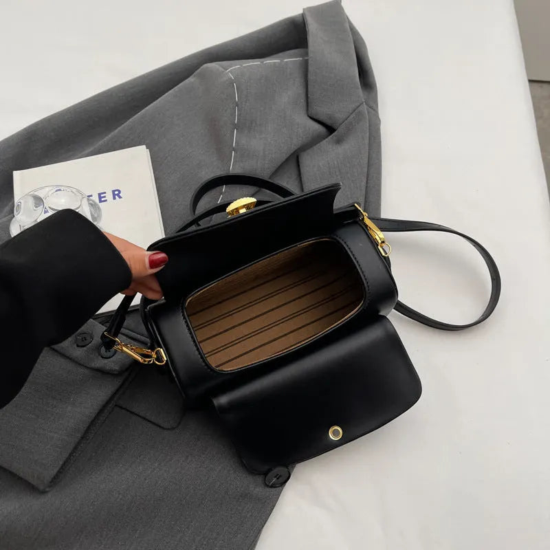 Personalised women's messenger bag with decorative stitching and letter details in medium-hard PU material