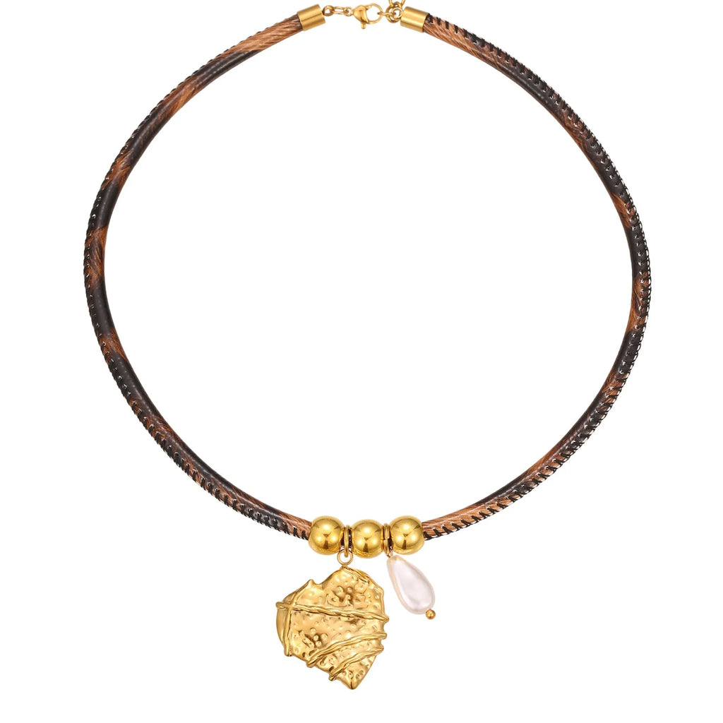 Geometric leopard pendant necklace on a stainless steel chain with adjustable length between 41cm and 50cm.