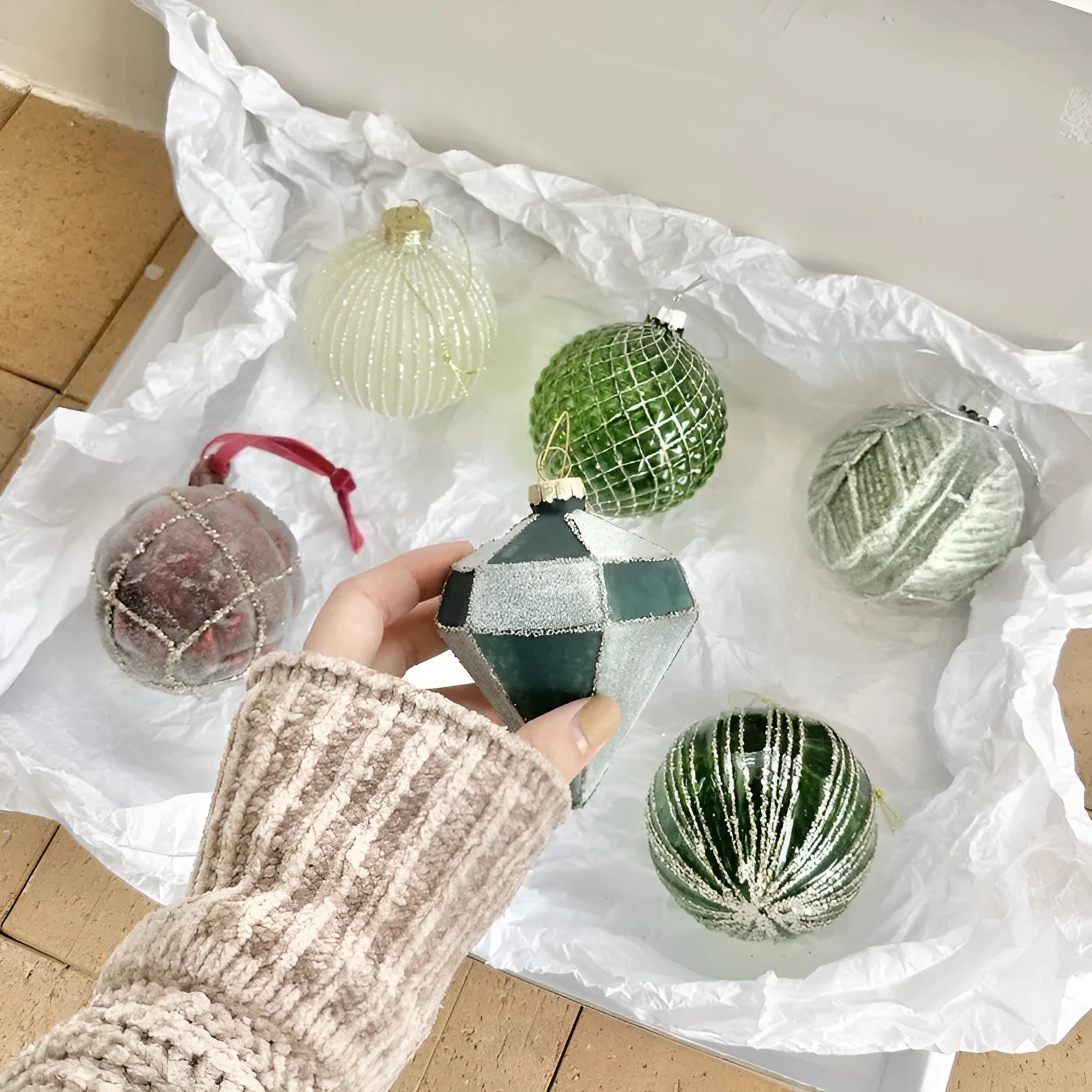 Handmade glass Christmas ball pendant ornament, 8cm diameter, green color, on tree branch