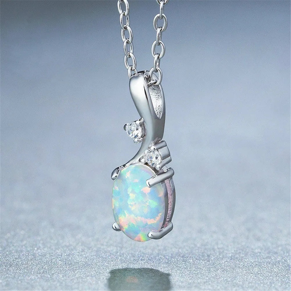 Water drop shaped opal pendant necklace on adjustable O-shaped chain in rose gold or white plating