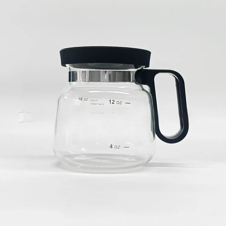 Transparent borosilicate glass coffee maker with silicone protective cover showing brewing capacity