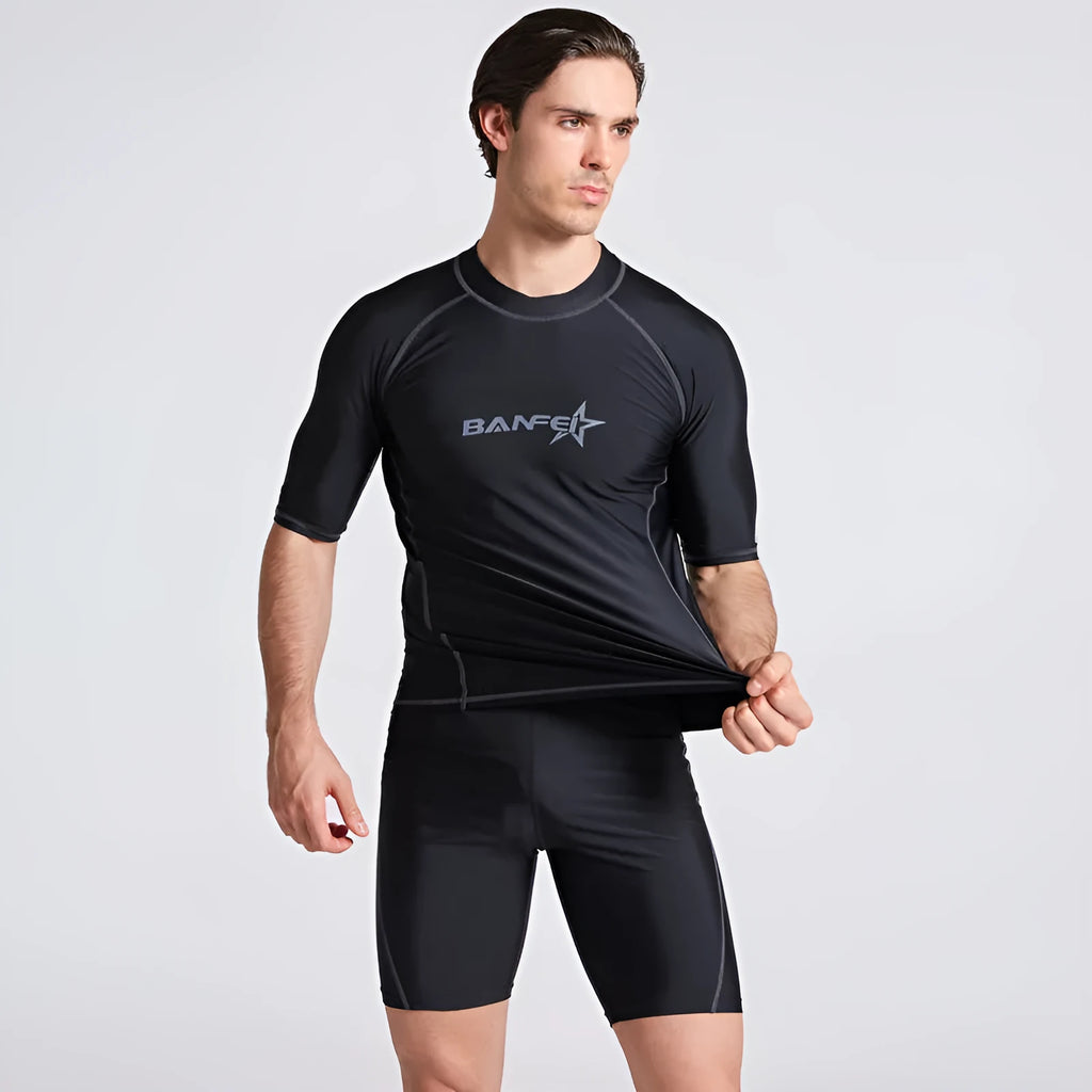 Men's blue quick-drying half sleeve nylon swimsuit set with swim top and pants for snorkelling