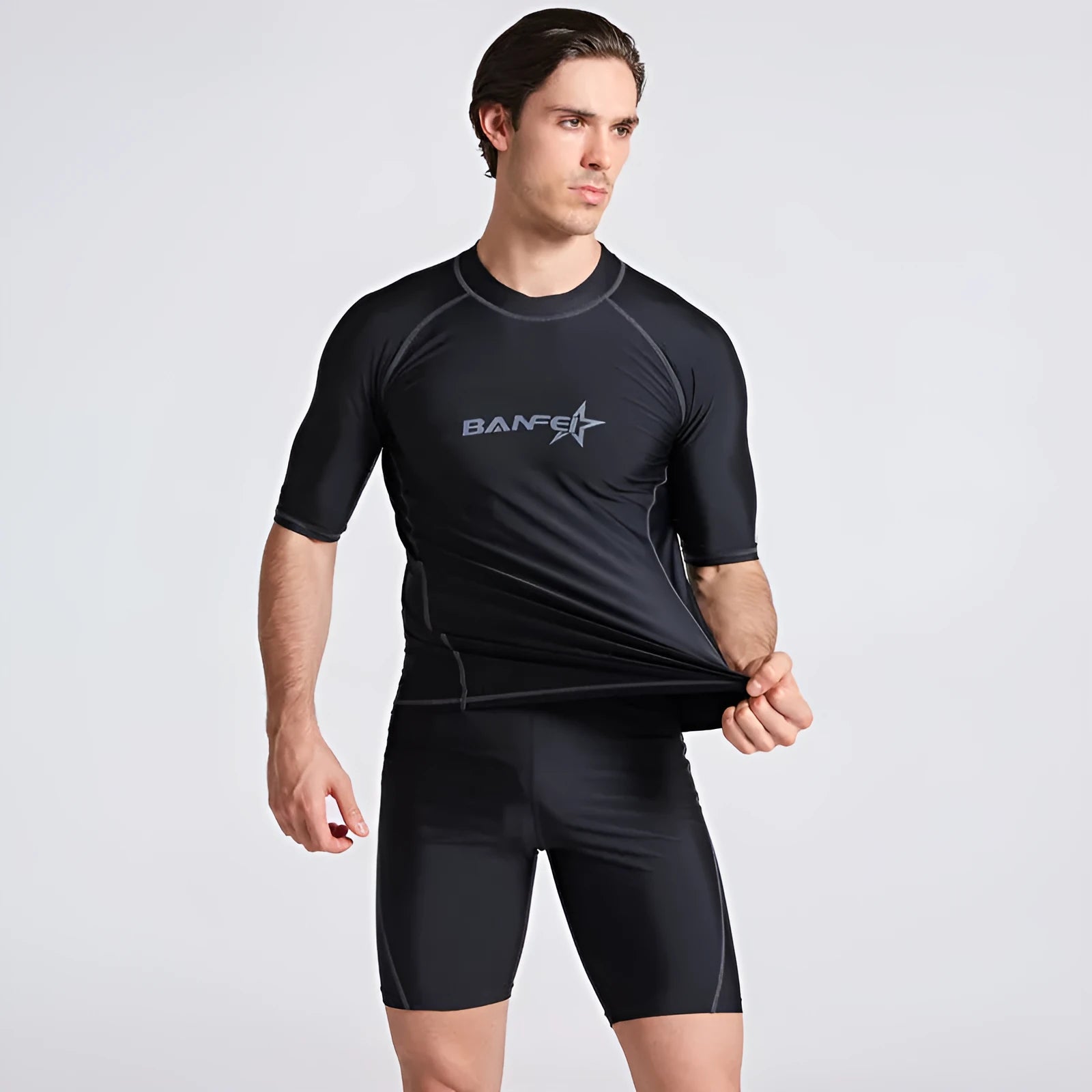 Men's blue quick-drying half sleeve nylon swimsuit set with swim top and pants for snorkelling