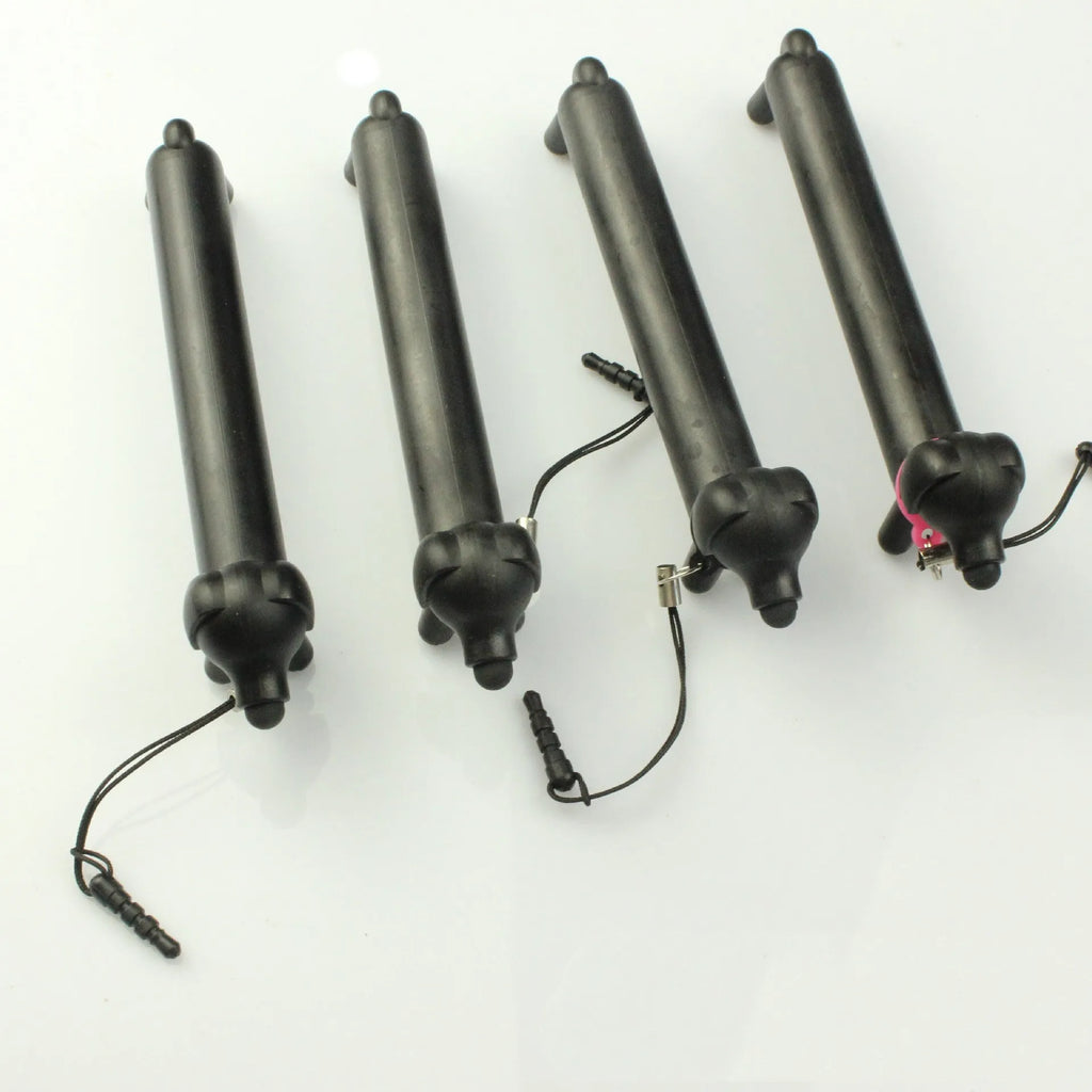 Black dog-shaped touch screen stylus with conductive construction shown next to its carry pouch