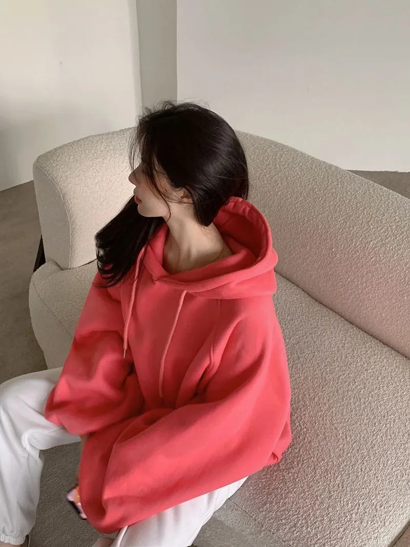 Women's loose mulberry silk hooded sweater in watermelon red colour without sleeves