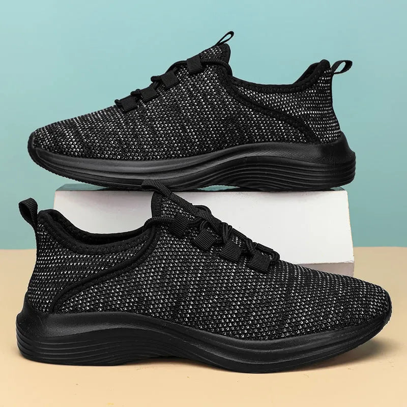 Women's Flyknit mesh casual sneakers in black, pink, or grey with round toe and lace-up front