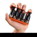 Grey and orange non-slip silicone finger trainer for musician hand strength development.