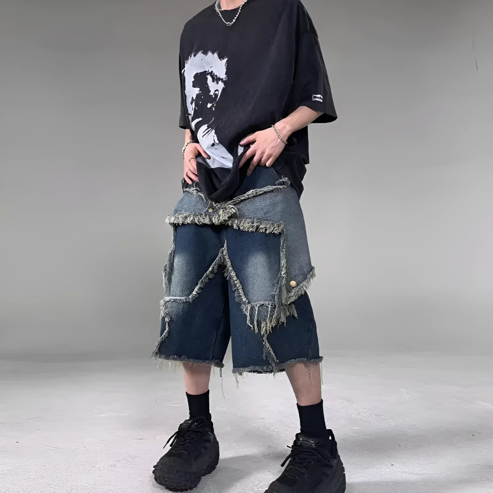 Men's blue denim shorts with frayed edges and five-pointed star design, loose fit for summer