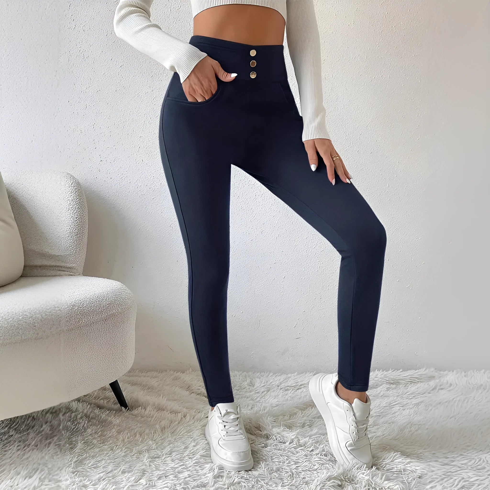 Navy blue women's high-waist straight-leg slim-fit trousers on a white background.