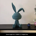 Suede blindfold rabbit resin table ornament in green, blue, or red colour options.