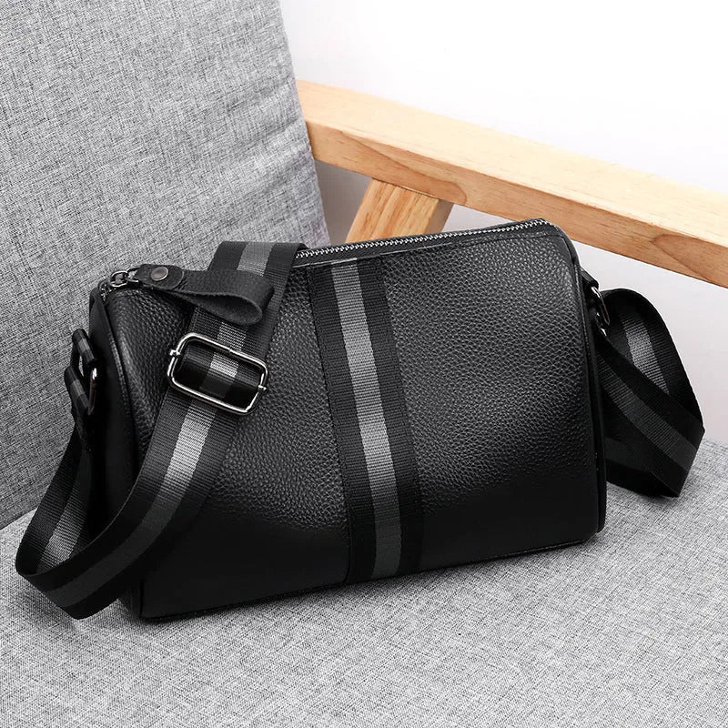 Black genuine leather one-shoulder crossbody bag showing front view