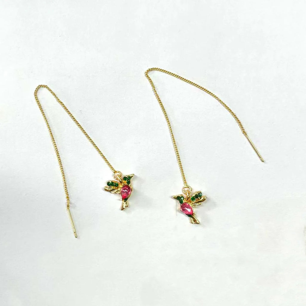 Personalised bird hanging earrings with zirconium wing detail and zodiac animal modelling in long drop style