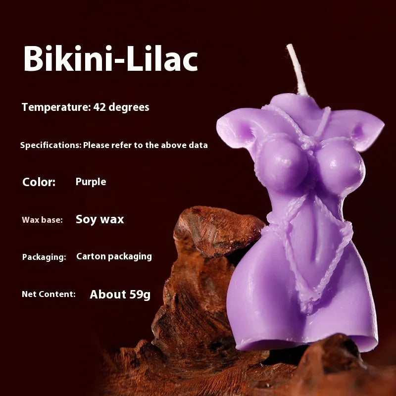 A low temperature soy wax massage candle shown in rose red, spring pink, and lilac purple colour options.