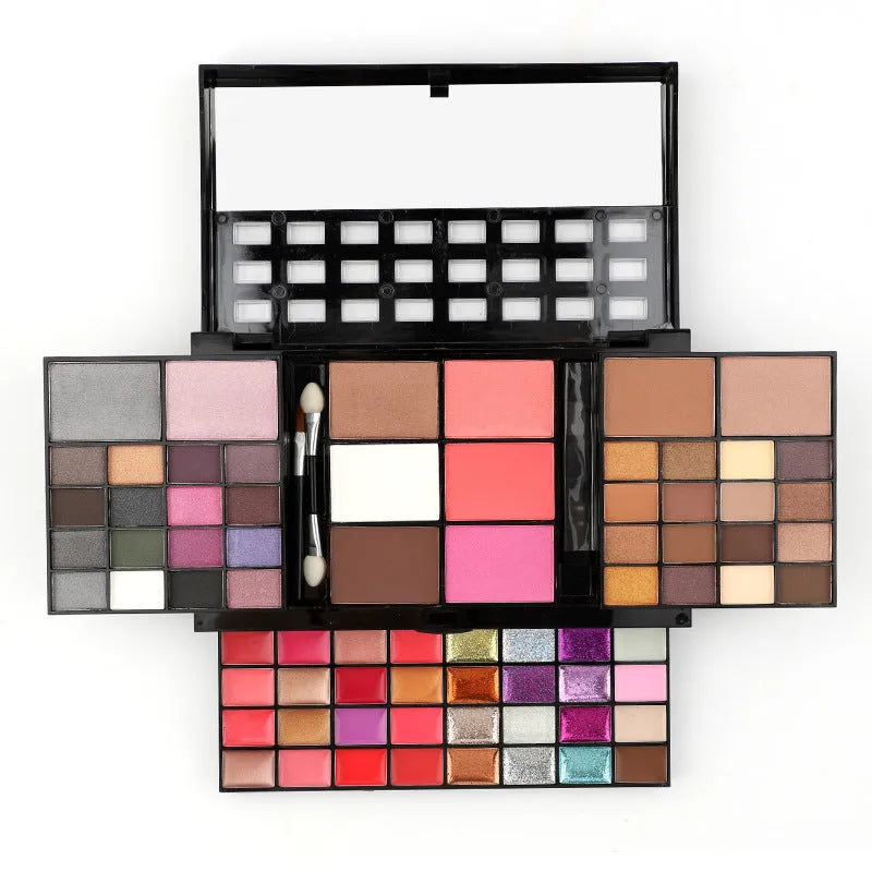 74 colour makeup palette open showing eyeshadow, lip gloss, blush and contour powders with brush and applicator